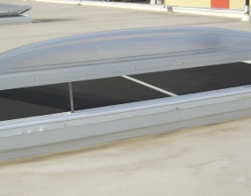 Electric venting skylight with aluminum curbs