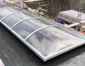 Continuous Barrel Vault Skylight with Clear Acrylic Domes