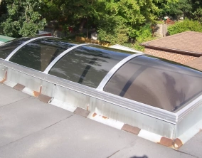 Barrel Vault Continuous Skylight with Bronze Acrylic Domes