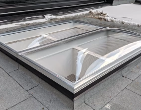 Clear Acrylic Butted Domes on Flat Roof