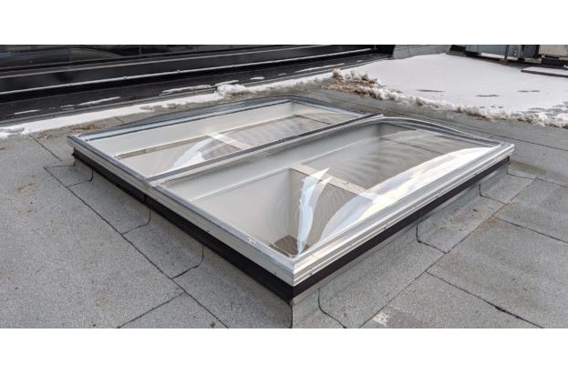 Clear Acrylic Butted Domes on Flat Roof