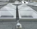 Thermoformed Acrylic pyramid skylight with aluminum curbs