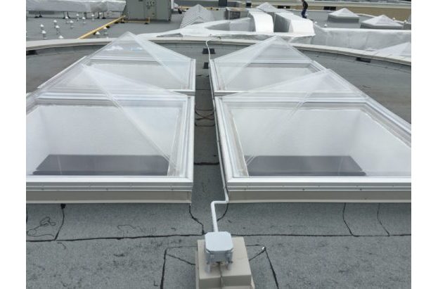 Thermoformed Acrylic pyramid skylight with aluminum curbs