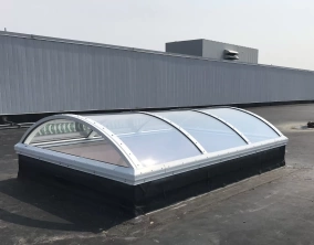 Architectural Continuous Barrel Vault Acrylic Skylight on a Flat Roof