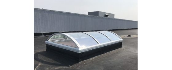 Architectural Continuous Barrel Vault Acrylic Skylight on a Flat Roof