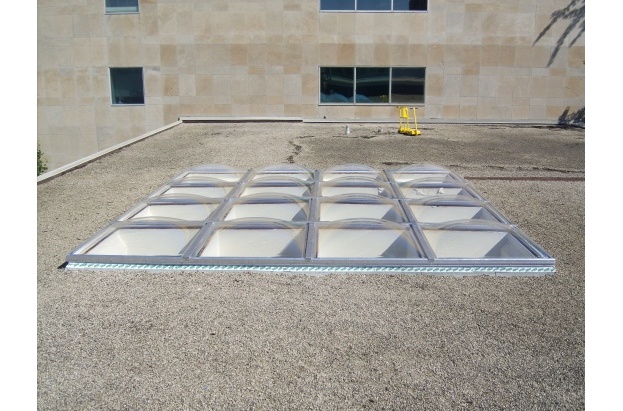 Clear Acrylic Butted Domes on Flat Ballast Roof